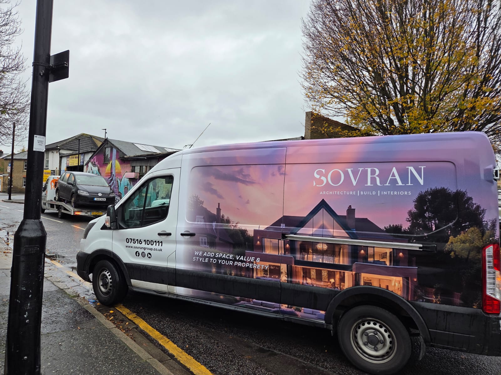 Sovran van wrap featuring an architectural property image