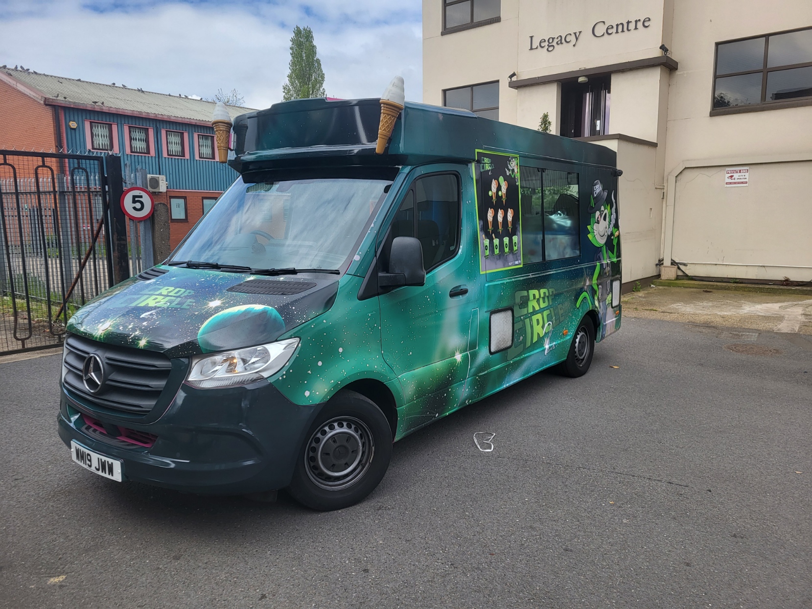 Green commercial van wrap completed by Addworks