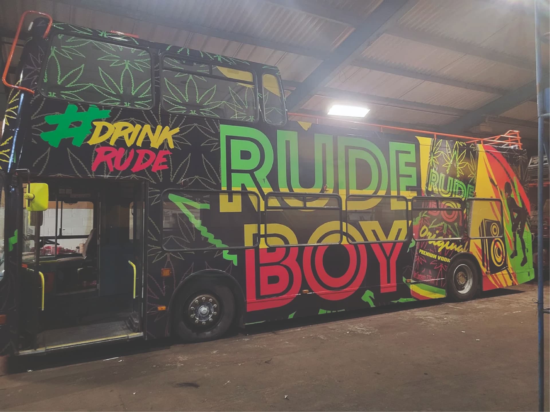 Colourful full promotional wrap on the Rude Boy bus