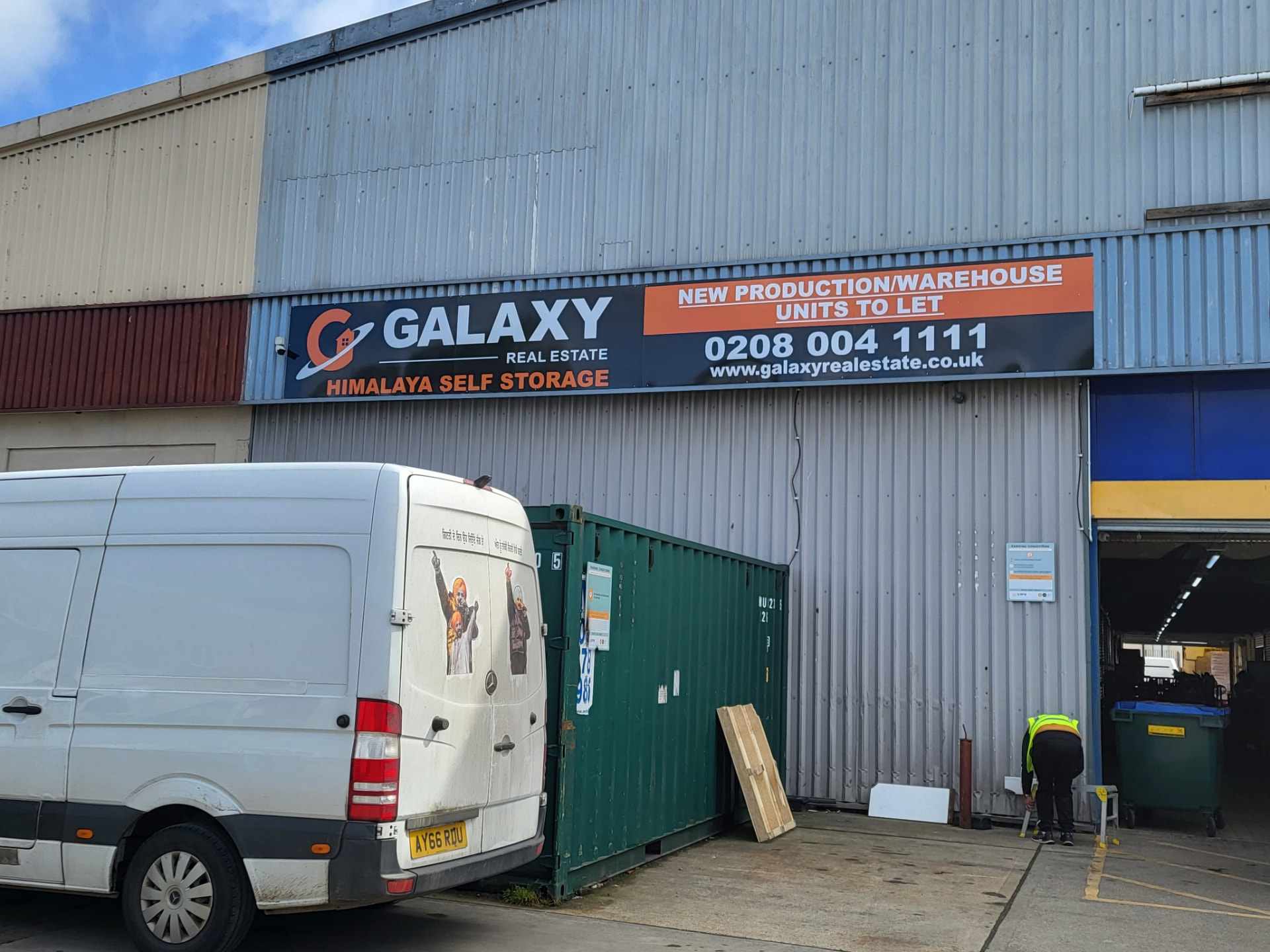 Large Galaxy exterior sign installed above an industrial unit